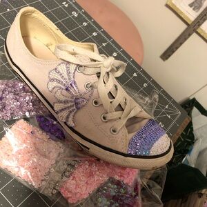 hand designed a pair of used converse